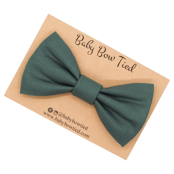 Hunter green clip-on bow tie for babies and boys on a Baby Bow Tied card
