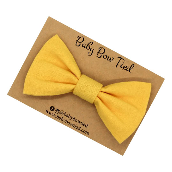 Yellow clip-on bow tie for babies and boys on a Baby Bow Tied card
